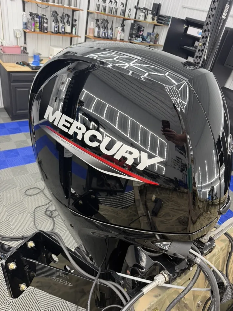 Mercury outboard motor cowling polished to a mirror finish